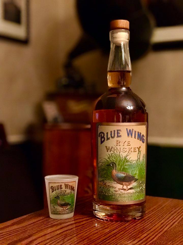 photo of Blue Wing Whiskey and shot glass